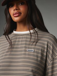 MISSGUIDED طقم منسق مخطط مكون من قطعتين: تي شيرت فضفاض بأكمام قصيرة وبنطال بالازو واسع الساق - بني - مشاهدة 4