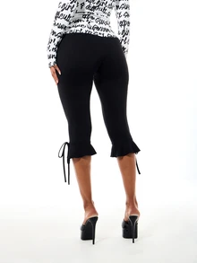 SUMWON WOMEN Leggings Capri con Bajo de Volantes y Detalle de Lazo, Longitud Recortada, Tiro Medio, Estilo Casual - Negro - Ver 2