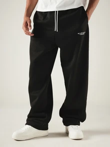 SUMWON Worldwide Studios Wide Leg Sweatpants With Drawstring Waist And Logo Print For Casual Everyday Wear - Black - View 5