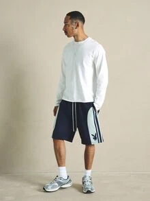 PLAYBOY X SUMWON Sporty Color Block Shorts With Three Stripe Side Panel And Bunny Logo Print - Multicolor - View 3