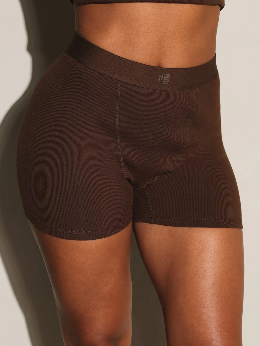 11SKNDS Ribbed Knit High Rise Cycling Shorts With Elastic Logo Waistband Skin Tight Mid Thigh Length Everyday Casual With Sweat-Wicking, Stretchy, Quick-Dry, Tummy Control & Sculpting, For Gym Workout Fitness Yoga Pilates Studio, Running, Training & Hy-Rox - Brown - View 1