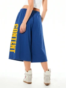 SUMWON WOMEN Wide Leg Culottes With Vertical Graphic Text Print, Elastic Drawstring Waist, Relaxed Fit Mid-Calf Length Fleece Shorts - Navy Blue - View 2