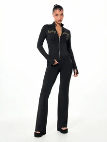 BABYPHAT Gold Script Logo Flare Pants With Cat Logo Detail Mid Rise Full Length Stretch Knit Bootcut Trousers - Black - View 3