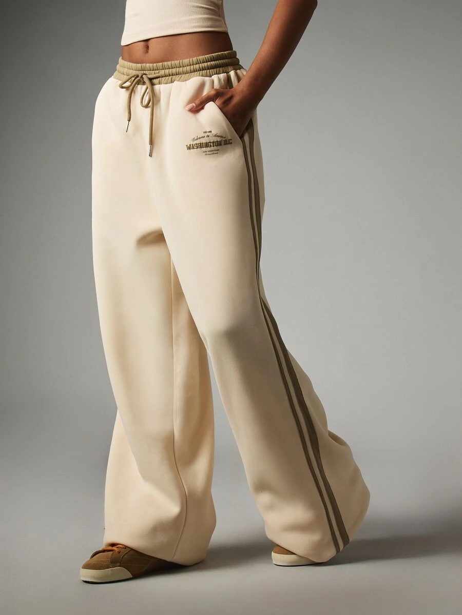 MISSGUIDED Wide Leg Jogger Pants With Contrast Olive Waistband Side Stripe And Washington D.C. Thigh Print Drawstring Waist - Beige - View 1