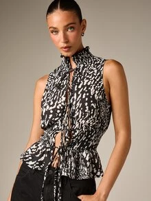 AiiRZ Sleeveless High Neck Smocked Waist Chiffon Blouse With Tie Front Detail And Abstract Animal Print Peplum Hem Summer Night Out Top - Multicolor - View 1