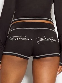 SUMWON WOMEN Low Rise Hot Pants Mini Shorts With Contrast Trim Detailing And Cursive Script Bum Print Drawstring Waist - Black - View 5