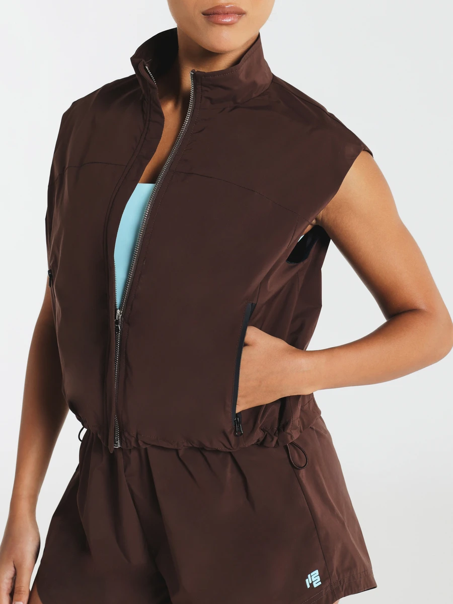 11SKNDS Sleeveless Full-Zip Vest With Stand Collar Zip Pockets And Drawstring Hem Lightweight Layering Outerwear For Fall Winter - Coffee Brown - View 1