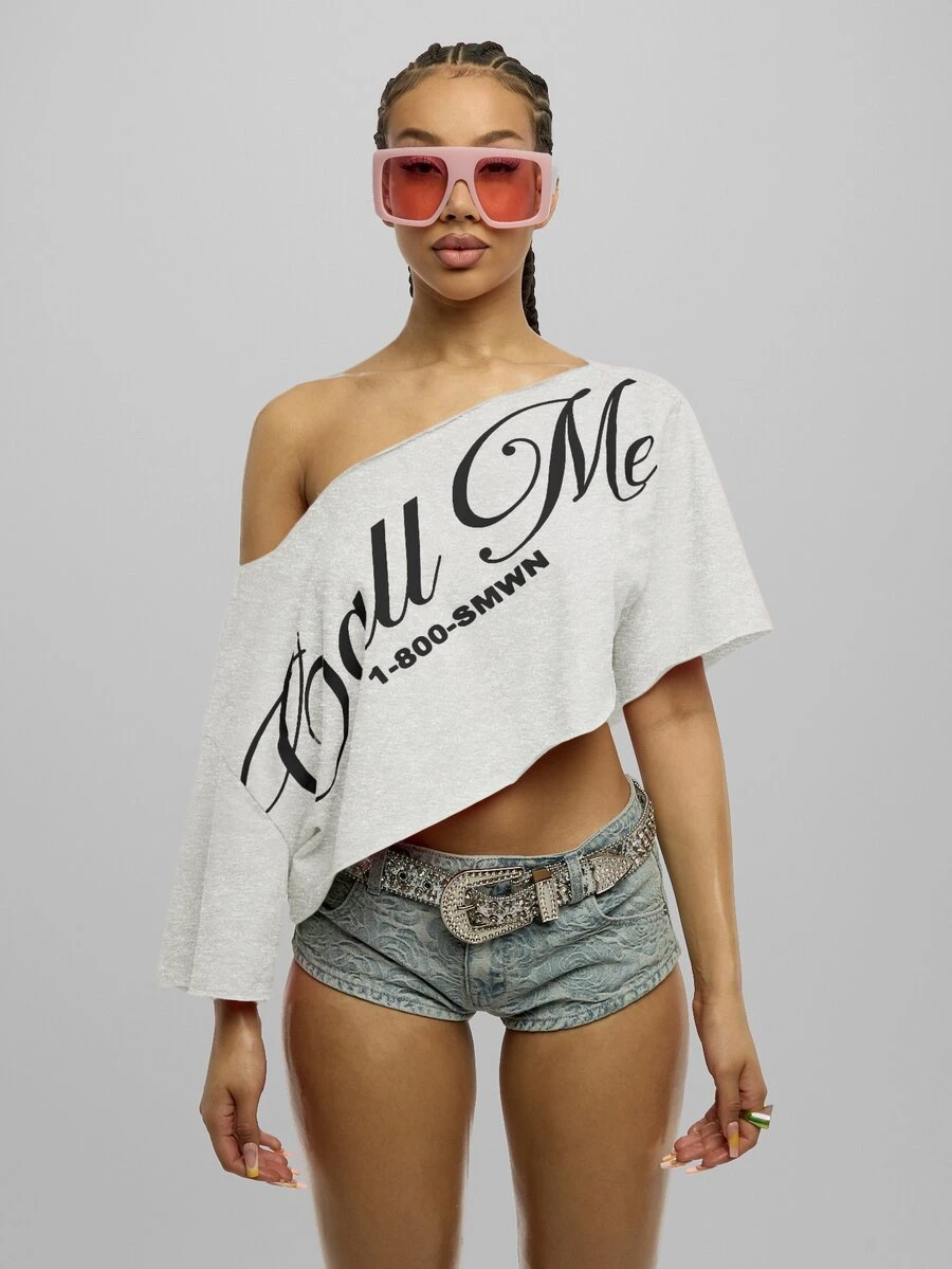 SUMWON WOMEN Off Shoulder Asymmetric Hem Graphic Script Print Crop Top - Oversized Boxy Fit One Shoulder Festival Party Summer Top - Light Grey - View 1
