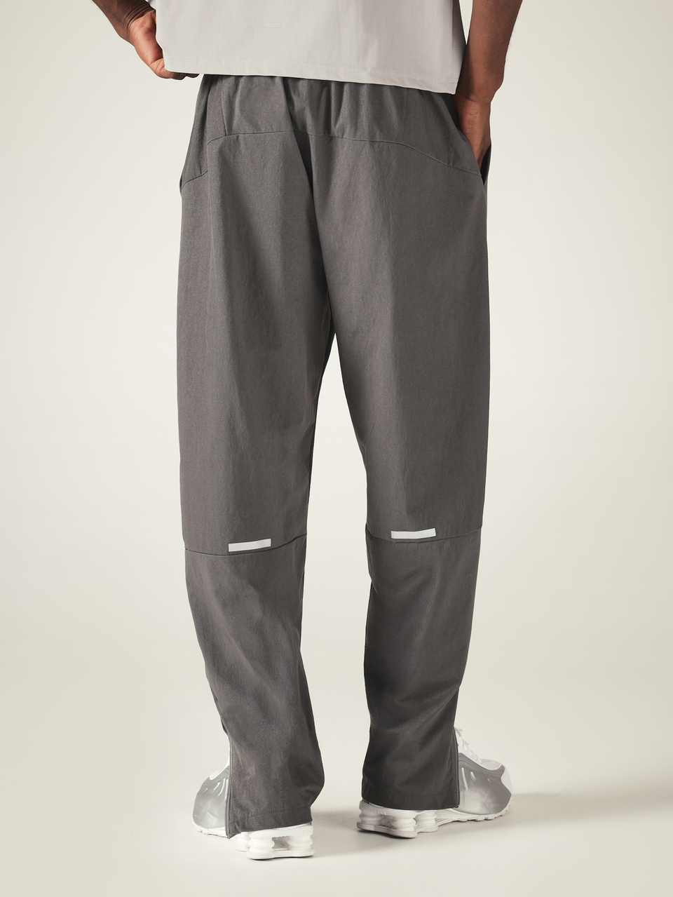 Wide Leg Track Pants With Side Split Hem Elastic Waist And Side Pockets Reflective Detail Charcoal Woven Trousers