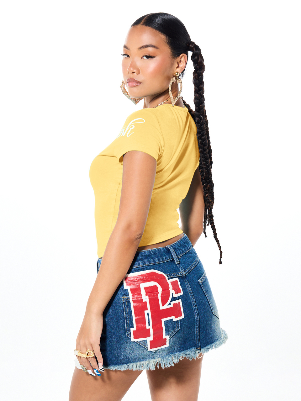 SUMWON Graphic Denim Mini Skirt With Frayed Hem And Patches