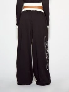 SUMWON WOMEN Crop Fit Wide Leg Drawstring Sweatpants With Contrast Waistband And Large Script Logo Leg Print Casual Relaxed Fit Full Length Trousers - Black - View 5
