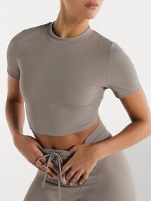 11SKNDS Fitted Crop Top With High Neck Short Sleeves Smooth Stretch Fabric Cropped Hem Summer Essential Minimalist Style With Sweat-Wicking, Breathable, Quick-Dry & Buttery-Soft, For Gym Workout Fitness Yoga Pilates Studio, Running, Training & Hy-Rox - Grey - View 1