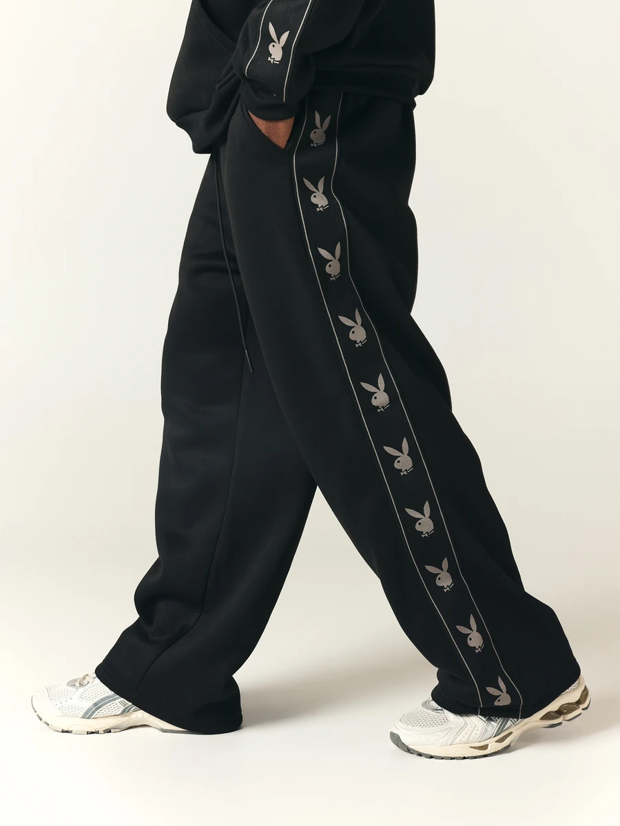 PLAYBOY X SUMWON Bunny Logo Side Tape Wide Leg Sweatpants With Drawstring Waist And Full Length Relaxed Fit For Casual Everyday Loungewear - Black - View 1