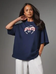MISSGUIDED Oversized Crew Neck Short Sleeve T-Shirt With College Athletics Sports Chest Graphic Print Casual Summer Essential - Navy Blue - View 1