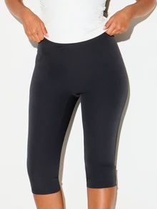 KIZN High Rise Cropped Capri Leggings Skin Tight Stretch Knit Seamless Waistband Below Knee Length Everyday Casual Staple - Black - View 1