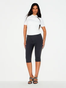 KIZN High Rise Cropped Capri Leggings Skin Tight Stretch Knit Seamless Waistband Below Knee Length Everyday Casual Staple - Black - View 4