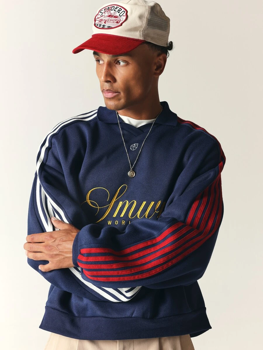 SUMWON Worldwide Oversized Sweatshirt With Collared Neckline Gold Embroidery And Contrast Stripe Sleeves - Navy Blue - View 1