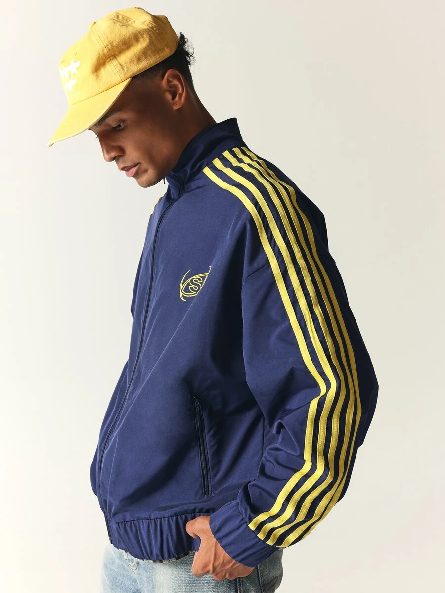 SUMWON Navy Blue Windbreaker Jacket With Yellow Stripe Detail Full Zip Mandarin Collar Hip Length Oversized Fit Embroidered Logo - Blue - View 1