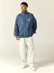 SUMWON Varsity Windbreaker Jacket With Full-Zip Closure Oversized Fit Contrast Red Piping Collegiate Back Graphic And Elastic Hem - Dusty Blue - View 3