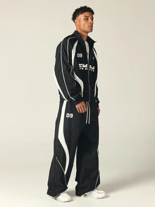 SUMWON Wide Leg Track Pants With White Contrast Panels Piping Elastic Waist Drawstring Ankle Hem Logo Embroidery Number Patch Fall Winter - Black and White - View 3