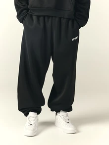 SUMWON Oversized Loose Fit Sweatpants With Elasticated Waist Drawstring And Side Stripe Detail Full Length Jogger Trousers - Black - View 4