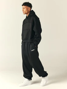 SUMWON Oversized Loose Fit Sweatpants With Elasticated Waist Drawstring And Side Stripe Detail Full Length Jogger Trousers - Black - View 3