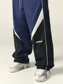 SUMWON Wide Leg Track Pants With Color Block Design And Contrast Piping Drawstring Waist Elastic Ankle Cuffs - Black - View 5