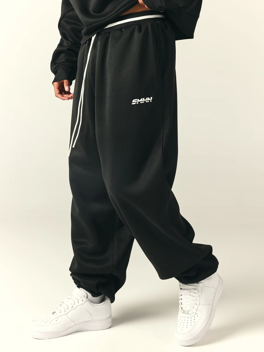SUMWON Oversized Loose Fit Sweatpants With Elasticated Waist Drawstring And Side Stripe Detail Full Length Jogger Trousers - Black - View 1