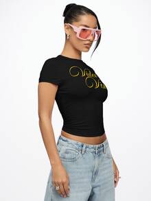 SUMWON WOMEN Video Vixen Gold Script Graphic Crop Top Short Sleeve Round Neck Fitted Cotton Slim Fit Tee Summer Festival Concert Party - Black - View 3