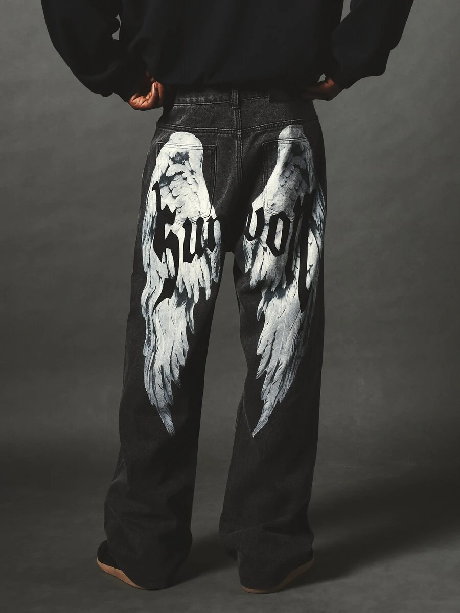 SUMWON Wide Leg Faded Denim Jeans With Angel Wings Back Graphic Print And Gothic Text Streetwear Style Full Length - Dark Wash - View 1