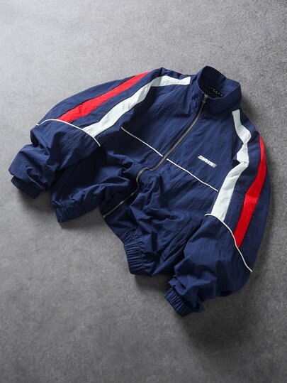 SUMWON Vintage Nylon Track Jacket With Red And White Color Block Panels Elastic Cuffs Zip Pockets And Satin Lining