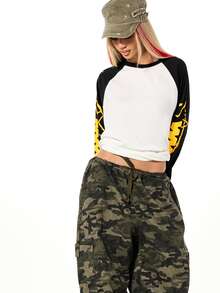 SUMWON WOMEN Oversized Raglan Long Sleeve Top With Graffiti Logo Print On Sleeves Colorblock Baseball Style Crew Neck Shirt - Black and White - View 6