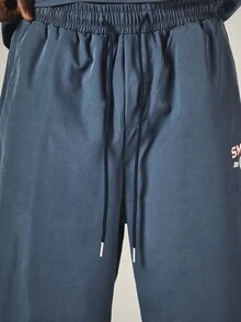 SUMWON Wide Leg Track Pants With Red Contrast Piping Side Split Hem Collegiate Logo Print Drawstring Waist - Blue - View 6