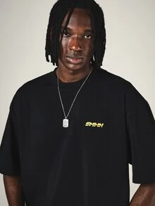SUMWON Street Racing Graphic Oversized Crew Neck T-Shirt With Large Back Print And Yellow Logo Detail - Black - View 4