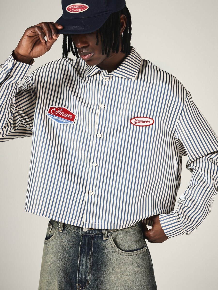 SUMWON Cropped Boxy Button-Up Shirt With Vertical Stripes And Embroidered Brand Patches On Chest Long Sleeve Collared - Navy Blue - View 1