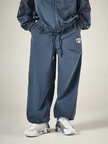 SUMWON Wide Leg Track Pants With Red Contrast Piping Side Split Hem Collegiate Logo Print Drawstring Waist - Blue - View 4