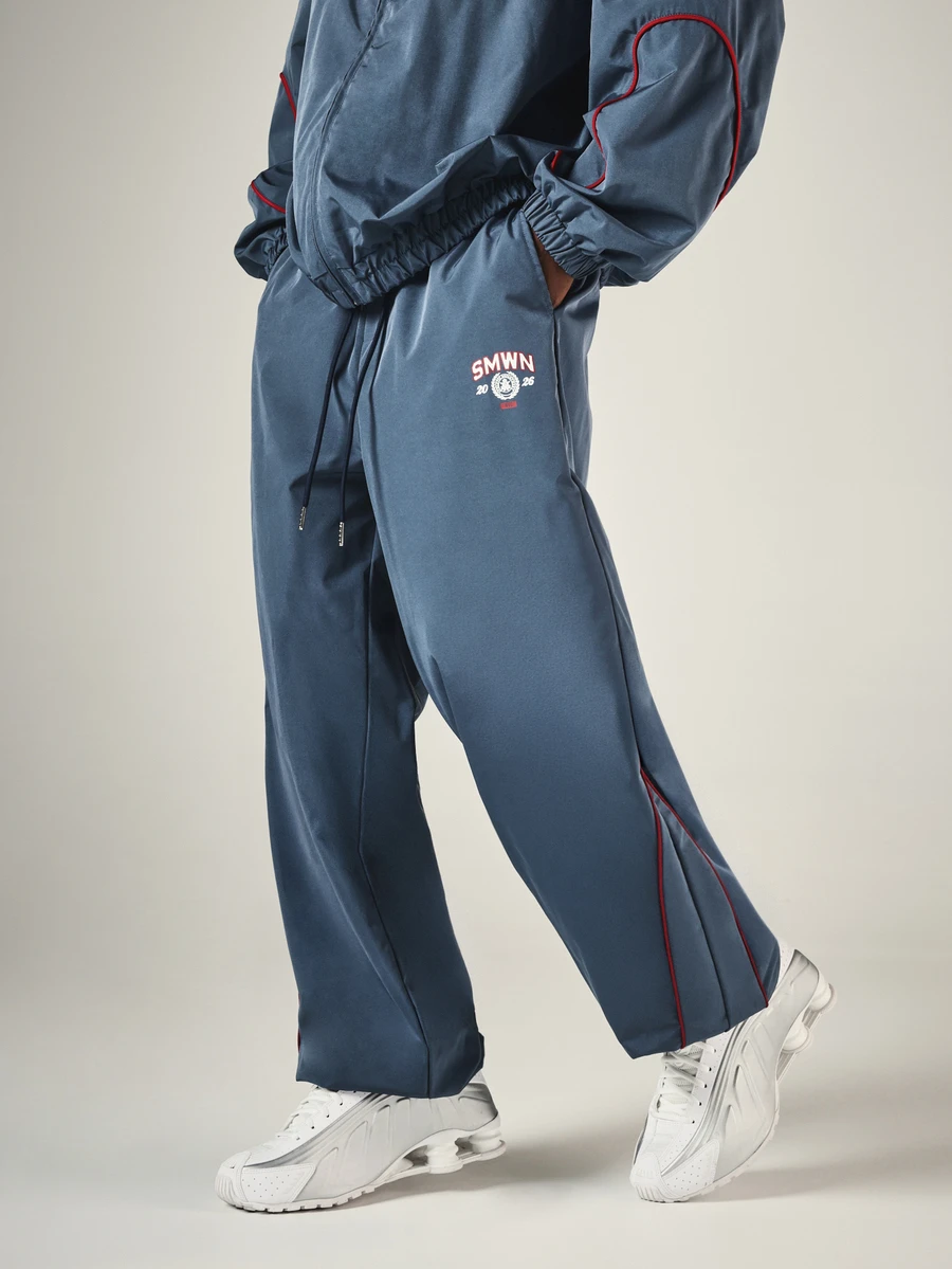 SUMWON Wide Leg Track Pants With Red Contrast Piping Side Split Hem Collegiate Logo Print Drawstring Waist - Blue - View 1