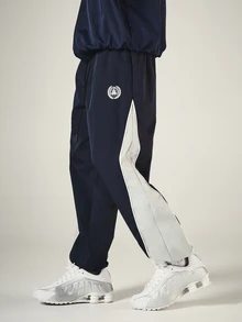 SUMWON Navy Side Panel Track Pants With Sheild Logo Detail Contrast Stripe Elastic Ankle Cuff Drawstring Waist - Navy Blue - View 1