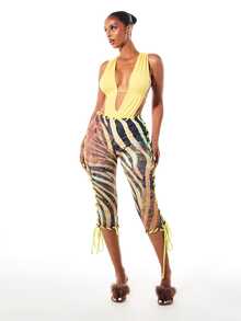 SUMWON WOMEN Tiger Print Capri Leggings With Neon Yellow Lace-Up Side Detail And Cropped Length Summer Festival Bottoms - Yellow - View 5