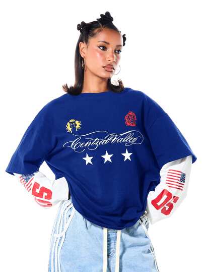 SUMWON WOMEN Oversized Graphic T-Shirt With Central Valley Script Print Stars Sheild Emblem And Layered Long Sleeve Detail Drop Shoulder Casual Tee