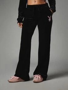 Missguided x Playboy Bunny Velvet Flared Trousers With Drawstring Waist Side Pockets And Iconic Logo Print On Thigh - Black - View 1