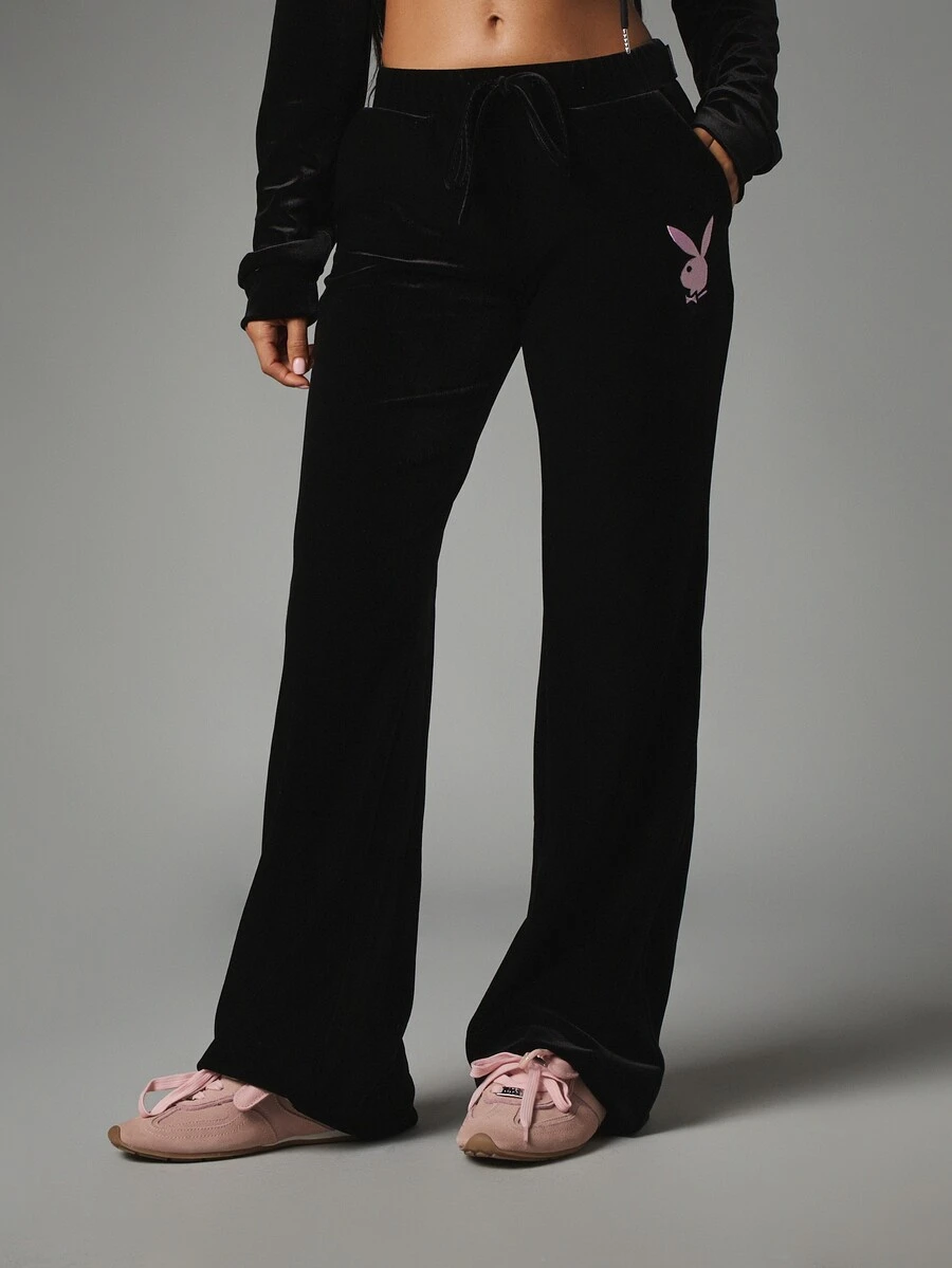 Missguided x Playboy Bunny Velvet Flared Trousers With Drawstring Waist Side Pockets And Iconic Logo Print On Thigh - Black - View 1