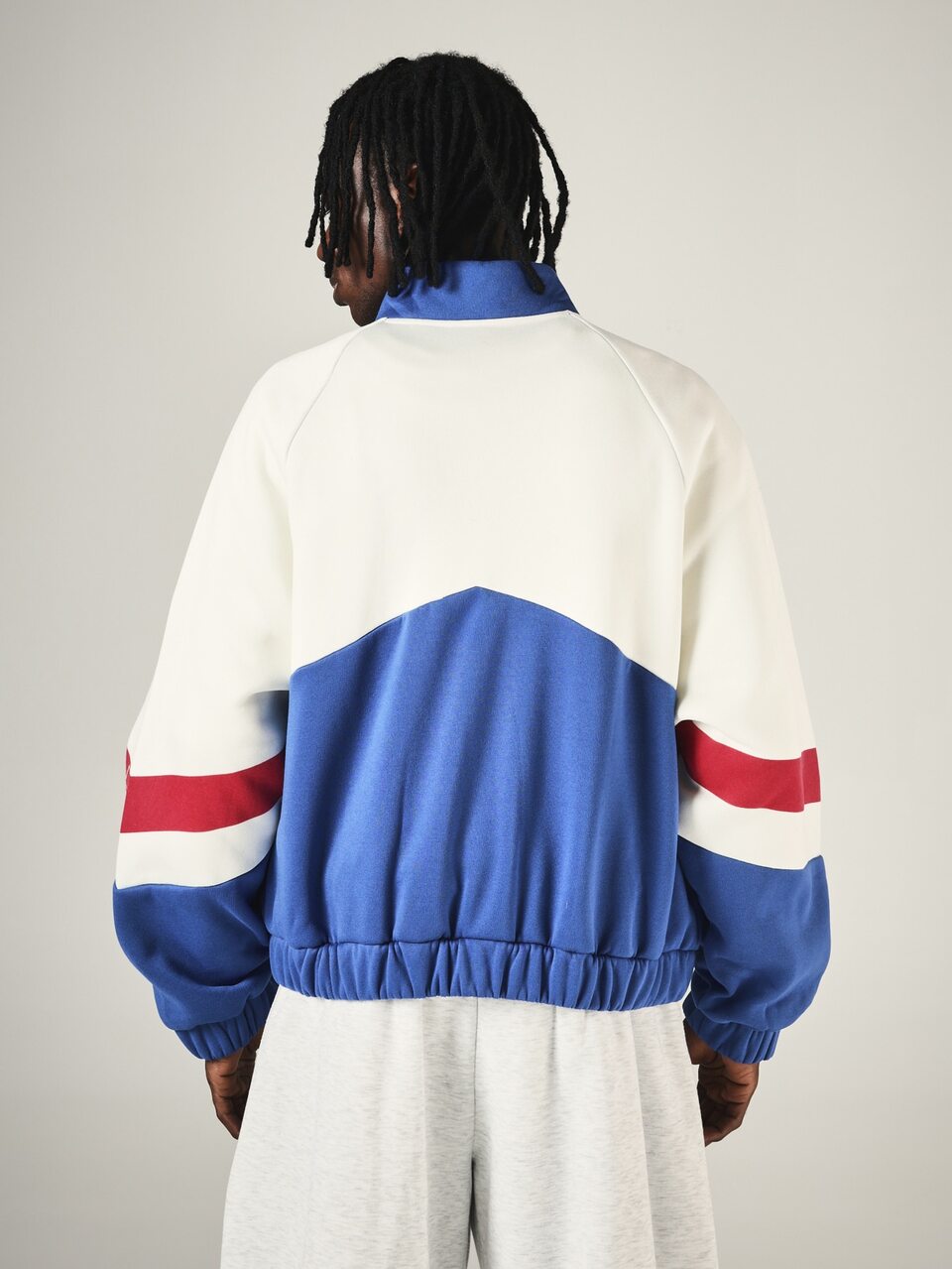 Oversized Color Block Varsity Jacket With Snap Button Closure Ribbed Collar Cuffs And Elastic Waistband Logo Sleeve Detail