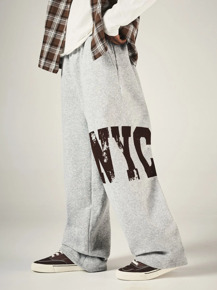 SUMWON NYC Graphic Wide Leg Sweatpants With Distressed Varsity Text Print, Fleece Casual Jogger Style Bottoms, Perfect For Fall Winter Street Style - Grey - View 1