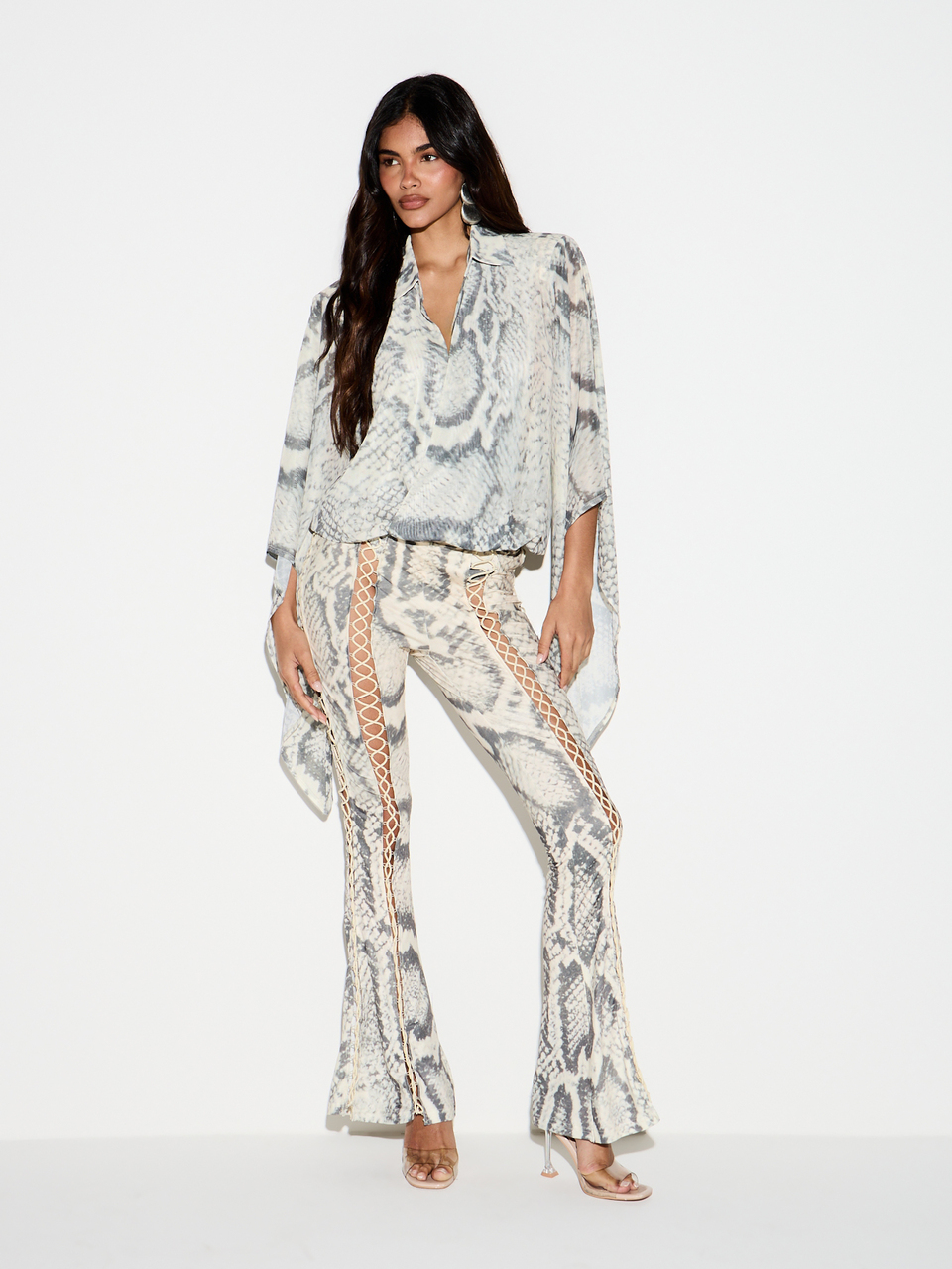 KIZN Snake Print Flared Pants With Lace-Up Side Detail