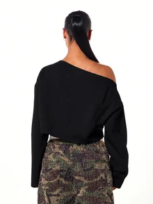 SUMWON WOMEN Oversized Crop Sweatshirt With Off Shoulder Neckline And Bold That Girl Graphic Print Front - Black - View 2
