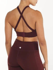 11SKNDS Halter Neck Crossback Sports Bra With Asymmetric Shoulder Cut-Out And Hook Closure With Sweat-Wicking, Stretchy, Breathable, Buttery-Soft, Low Impact Support & Removable Cups, For Gym Workout Fitness Studio, Running, Training & Hy-Rox - Brown - View 2