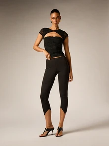 AiiRZ Quần legging cạp cao dáng lửng, ôm sát co giãn, xỏ chân, gấu nhọn bất đối xứng xẻ chi tiết - màu đen - Xem 2