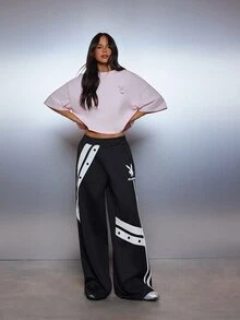 Missguided x Playboy Bunny Logo Oversized Boxy Crop T-Shirt With Large Back Graphic Print And Chest Logo Detail - Baby Pink - View 3