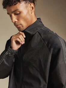 SUMWON Oversized Windbreaker Jacket With Zip Closure Mandarin Collar And Contrast Stripe Sleeve Detail With Embroidered Logo - Black - View 5